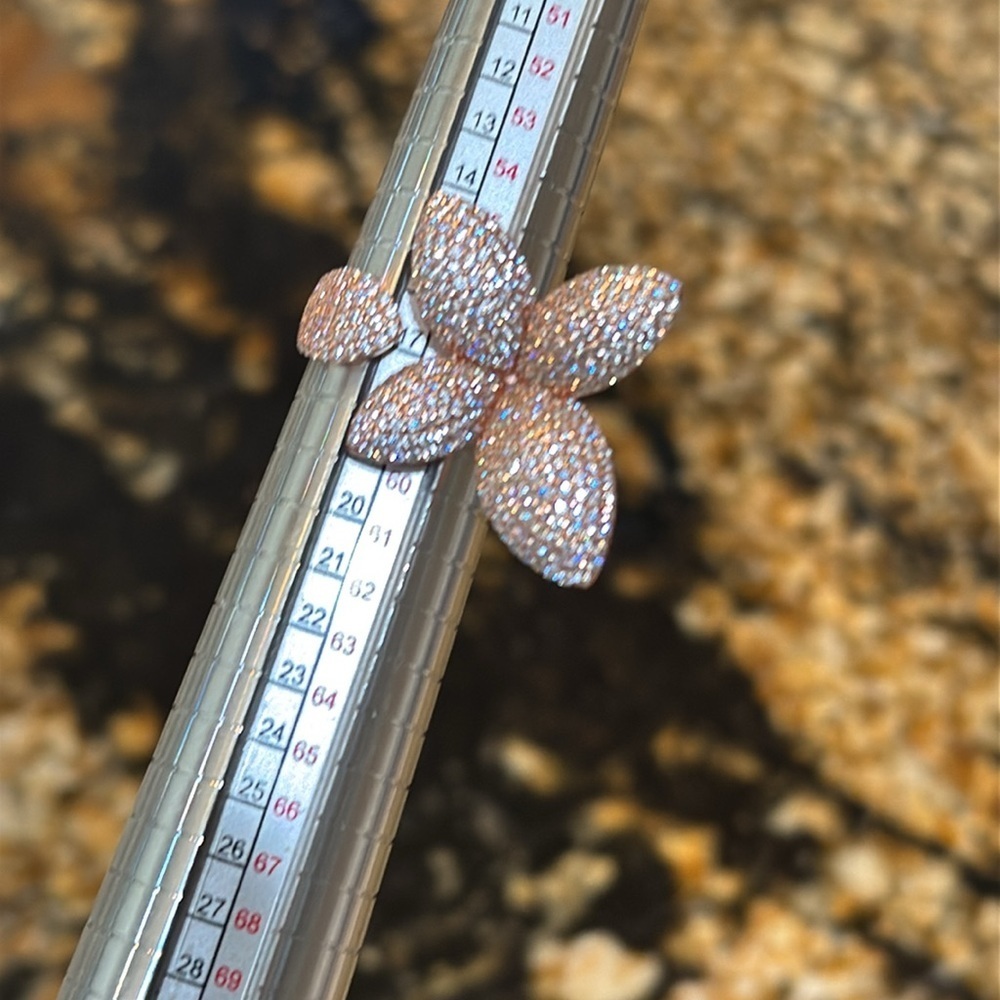 Elegant Rose Gold Floral Ring set on a sterling silver base. - Picture 10 of 11